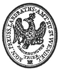 Das erste Siegel des Landkreises Sankt Wendel 1835; die Aufschrift lautet: Königlich-preussisches Landraths-Amt zu St. Wendel